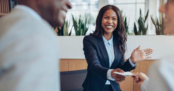 manager recognizing employee with gift